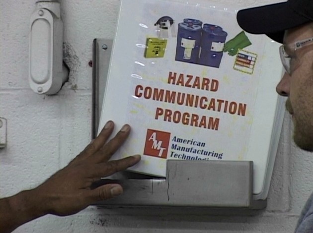 A manager training an employee on their Hazard Communication Program and the Right to Know law