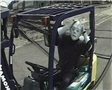 A dummy driving a forklift in an unsafe manner and causing a forklift accident