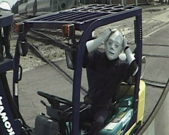 A dummy driving a forklift in an unsafe manner and causing a forklift accident