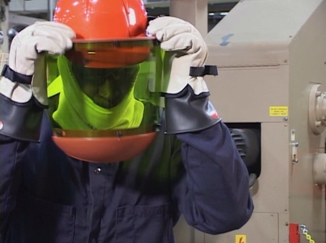 An industrial worker wearing the proper PPE or personal protective equipment required for his job