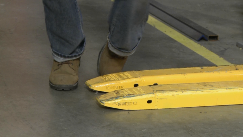 An example of a worker who does not understand how to prevent slips trips and falls in the workplace