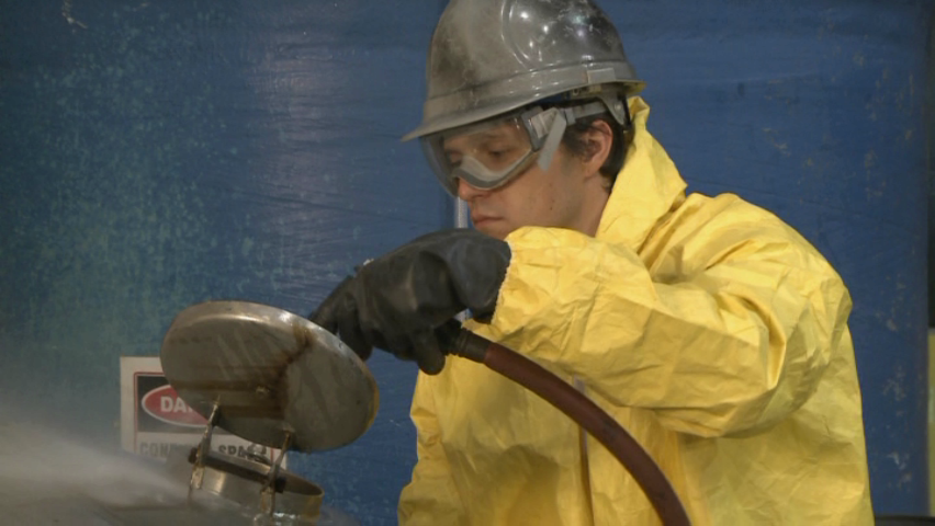 A worker wearing the proper PPE or Personal Protective Equipment for their job and work environment