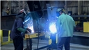 Welders working while being aware of the potential hazards of their job to stay safe at work