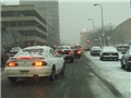 Drivers in snow and ice adjusting their driving technique to remain safe when winter driving
